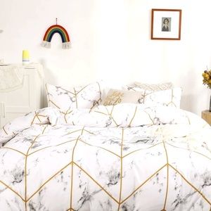 Marble bed spread with gold patern
